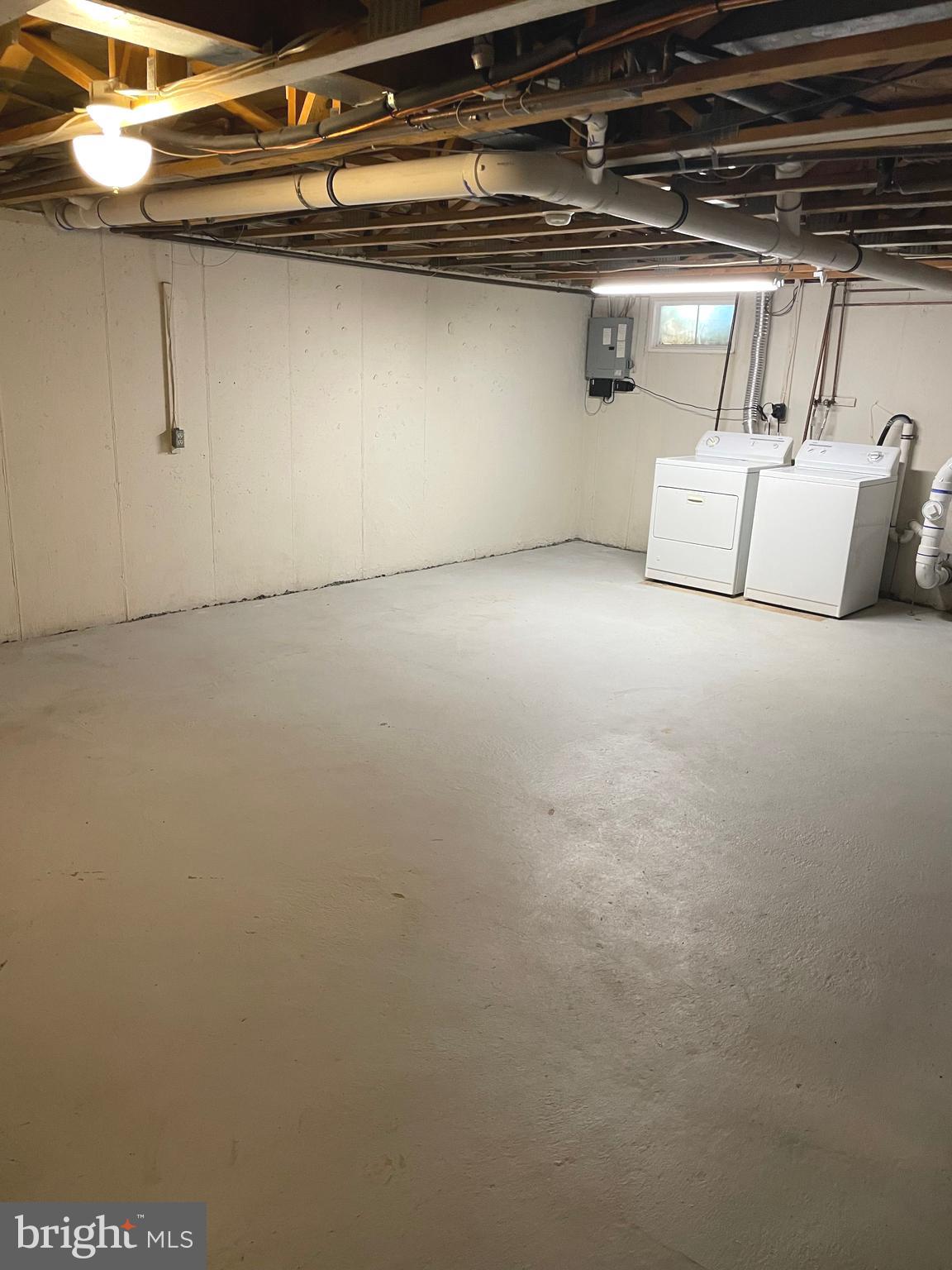 105 Bradbury Road Brookhaven, PA 19015 - Photo 16 of 18 Unfinished Basement with Laundry