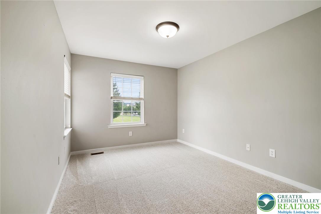 6022 Eli Circle Macungie, PA 18062 - Photo 26 of 29 a view of an empty room with a window
