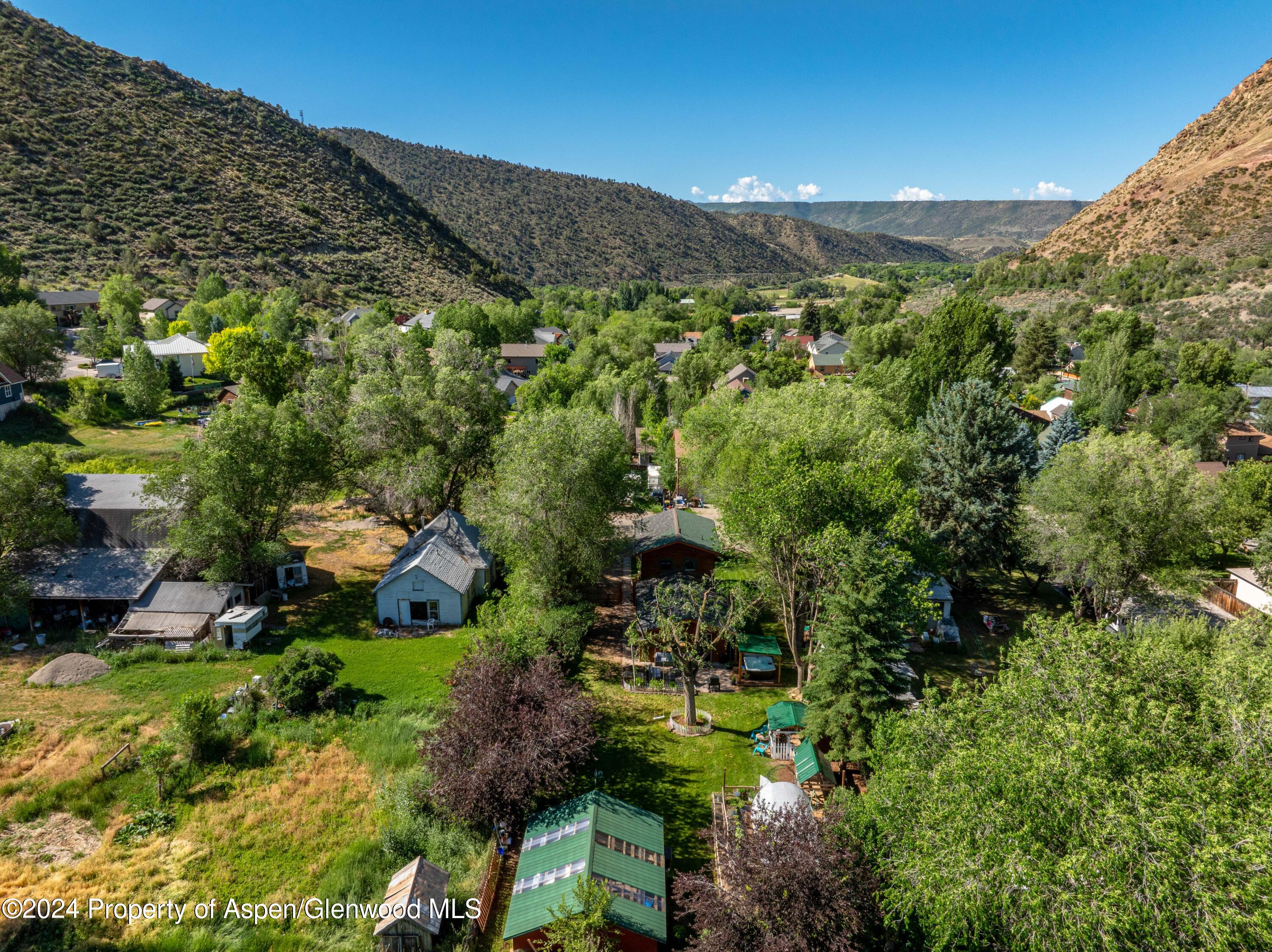 816 East 2nd Street New Castle, CO 81647 - Photo 11 of 32 a view of a city with mountains in the background