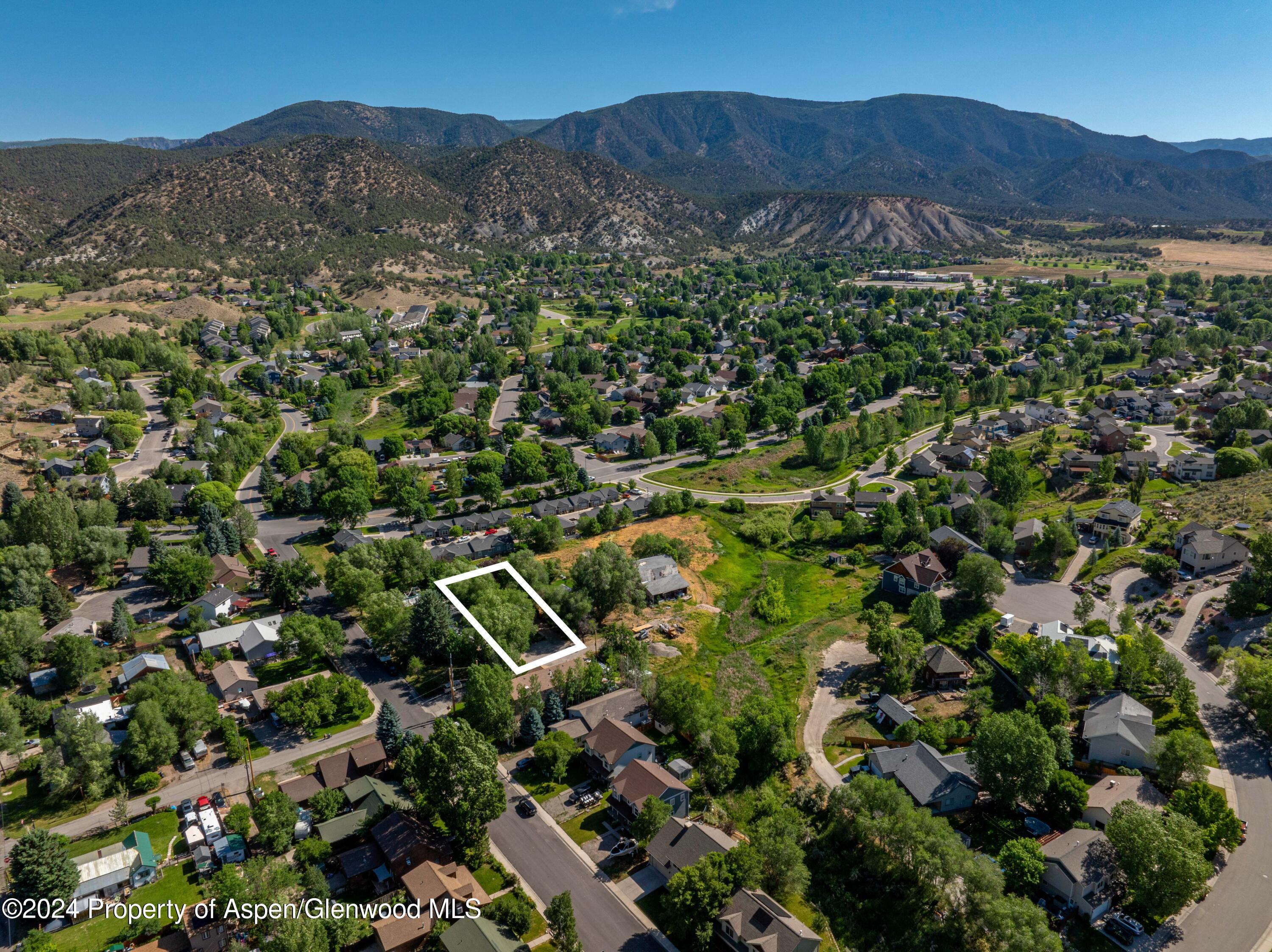 816 East 2nd Street New Castle, CO 81647 - Photo 30 of 32 an aerial view of a house with a garden