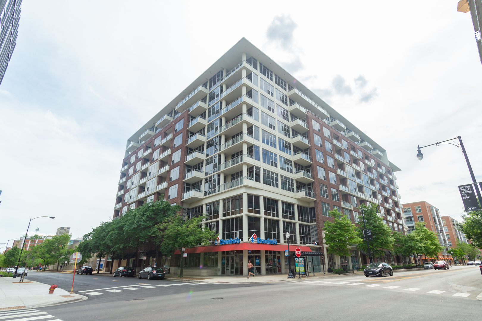 901 West Madison Street, Unit 509 Chicago, IL 60607 - Photo 1 of 14 a view of a building with a street