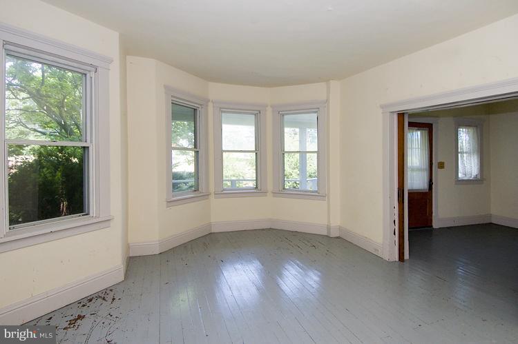 2311 Garrett Road White Hall, MD 21161 - Photo 1 of 13 an empty room with windows and closet