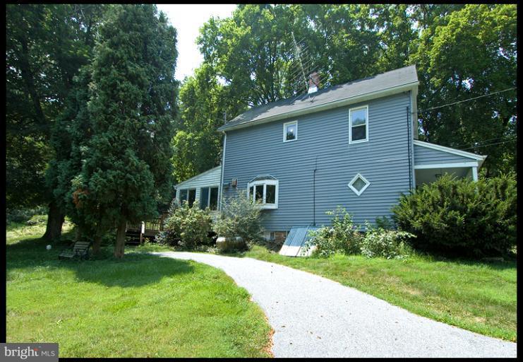 2311 Garrett Road White Hall, MD 21161 - Photo 10 of 13 a view of a backyard with garden