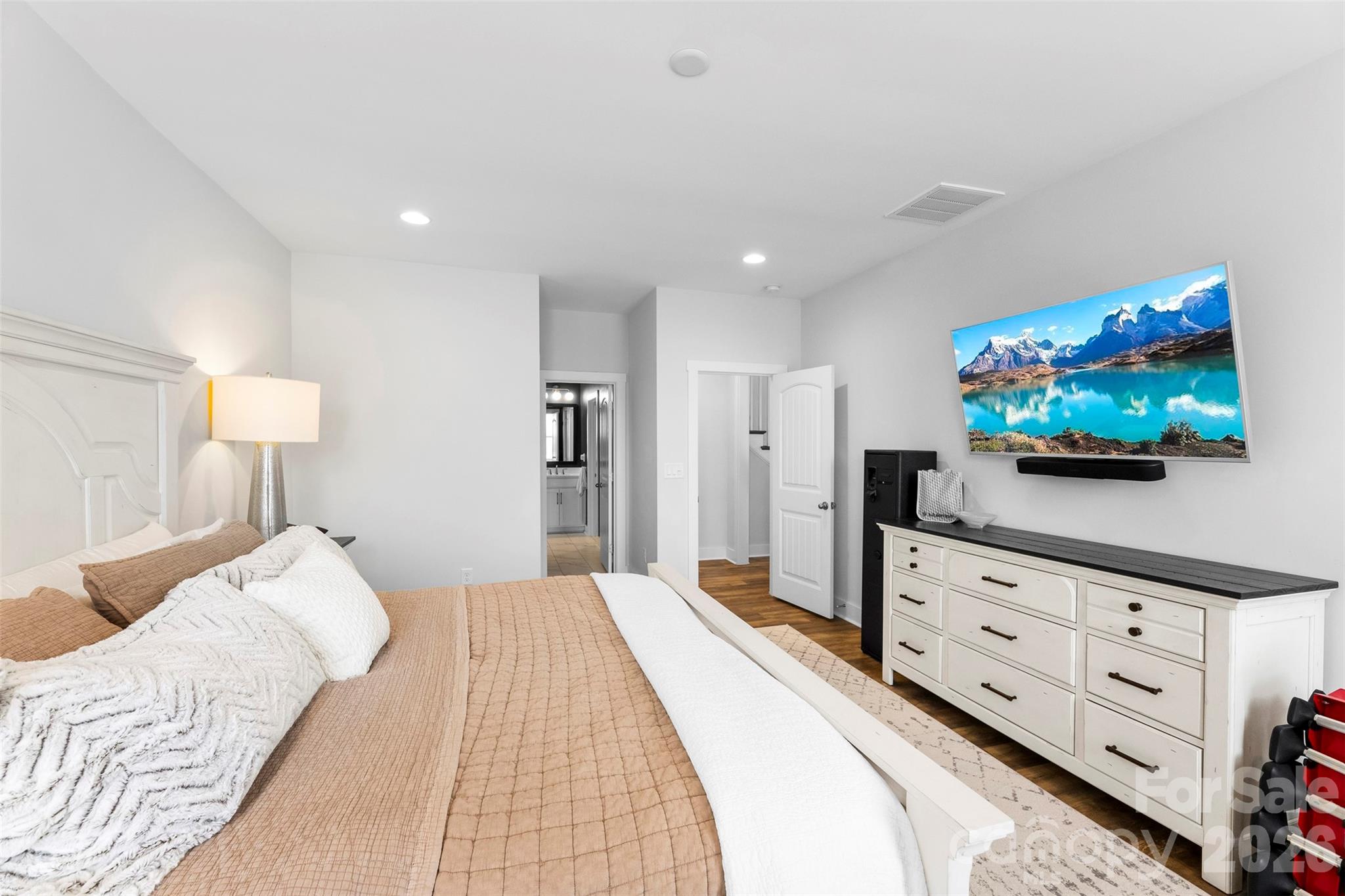 6283 Six String Court Fort Mill, SC 29708 - Photo 18 of 40 a bedroom with a bed and a flat screen tv