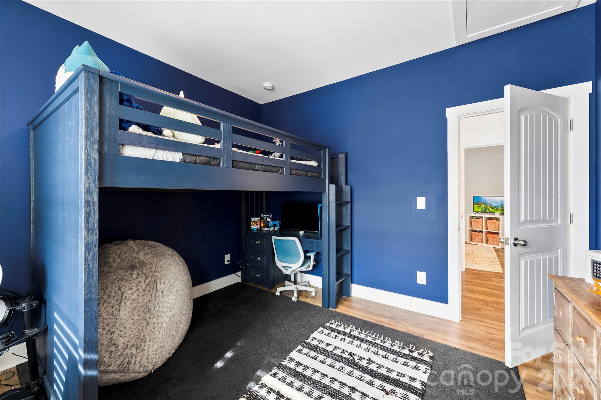 6283 Six String Court Fort Mill, SC 29708 - Photo 25 of 40 a bedroom with a bed and a mirror