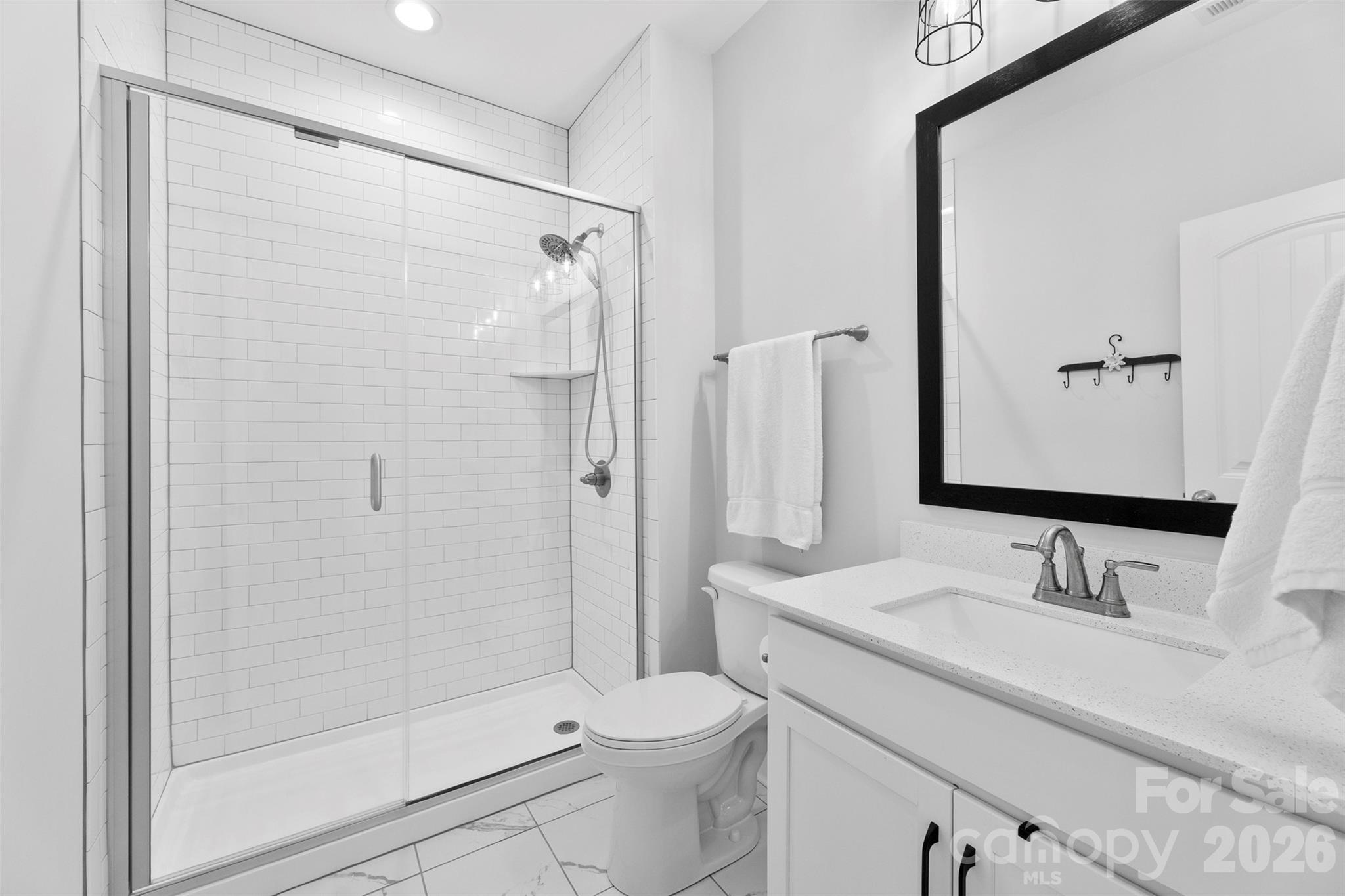6283 Six String Court Fort Mill, SC 29708 - Photo 29 of 40 a bathroom with a sink toilet and shower