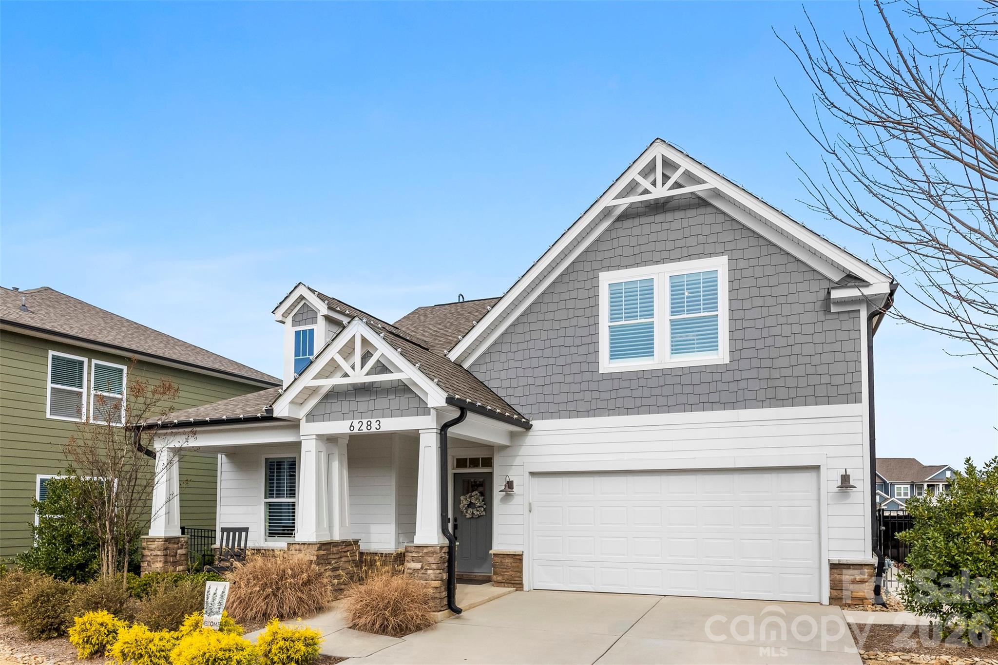 6283 Six String Court Fort Mill, SC 29708 - Photo 3 of 40 a front view of a house with a yard
