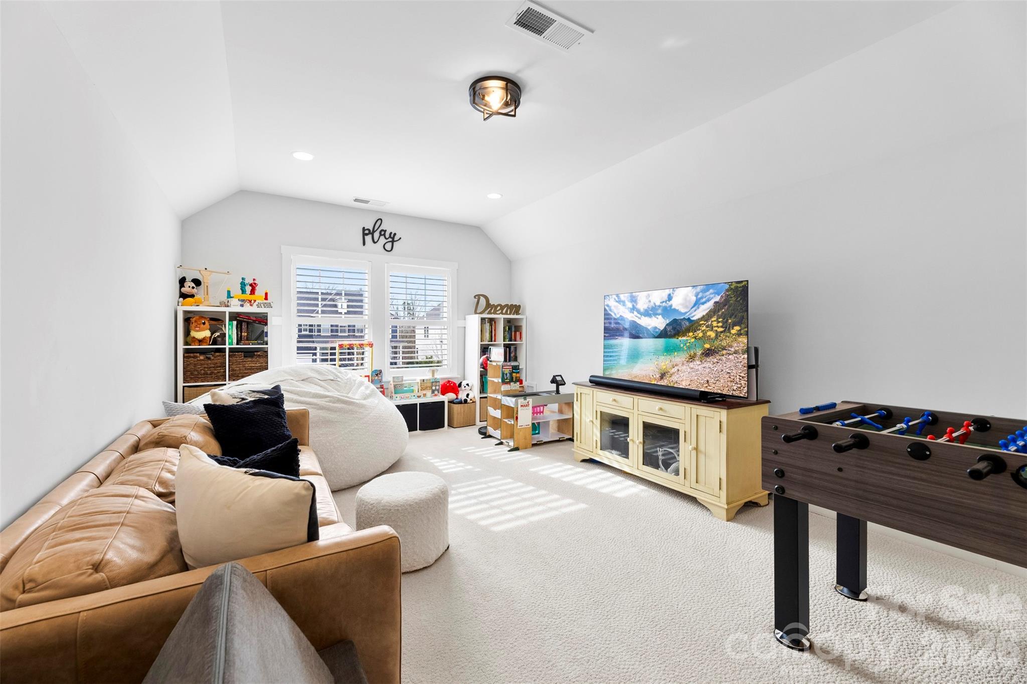 6283 Six String Court Fort Mill, SC 29708 - Photo 33 of 40 a living room with furniture and a flat screen tv