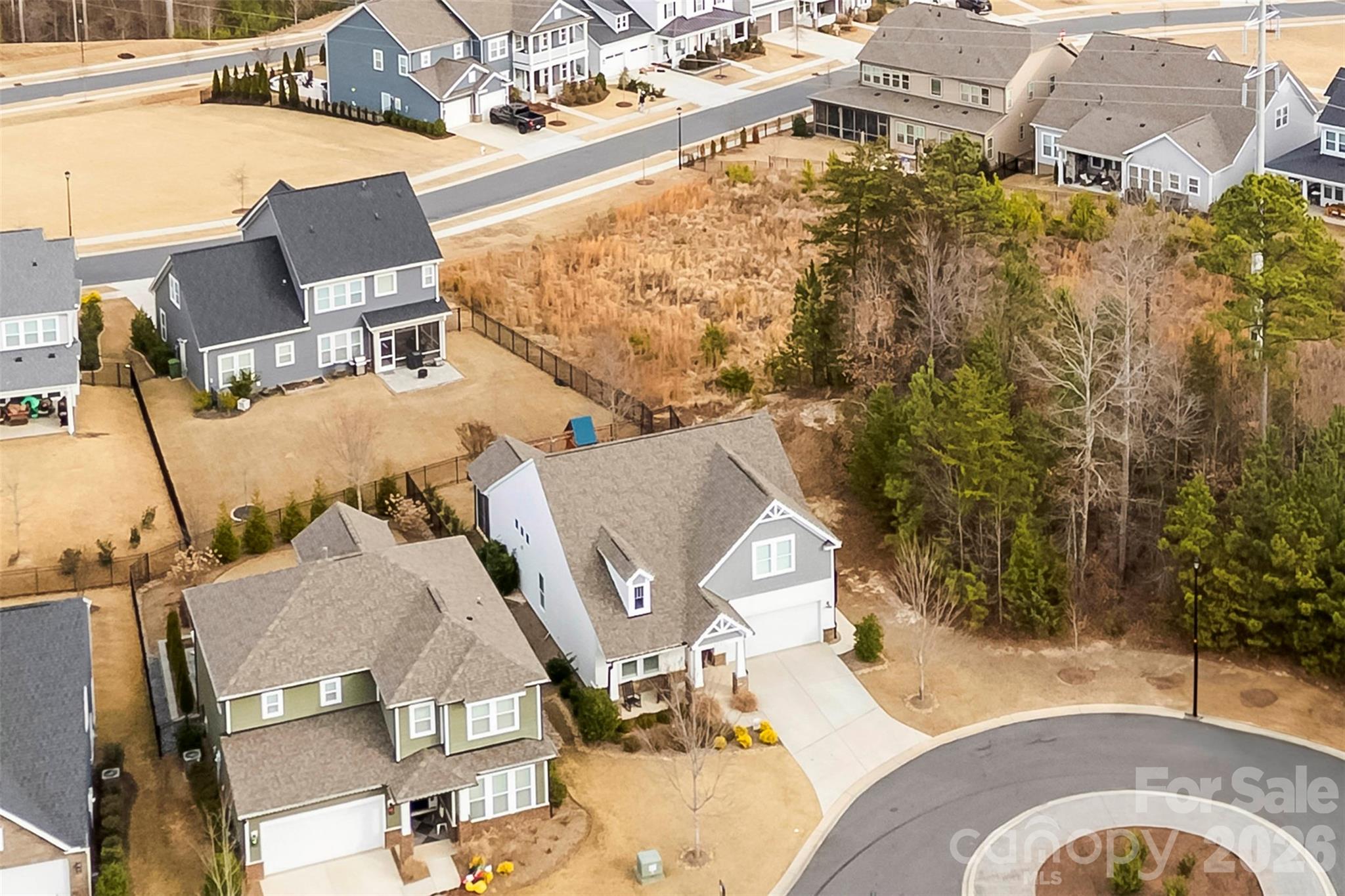 6283 Six String Court Fort Mill, SC 29708 - Photo 6 of 40 an aerial view of residential houses with outdoor space