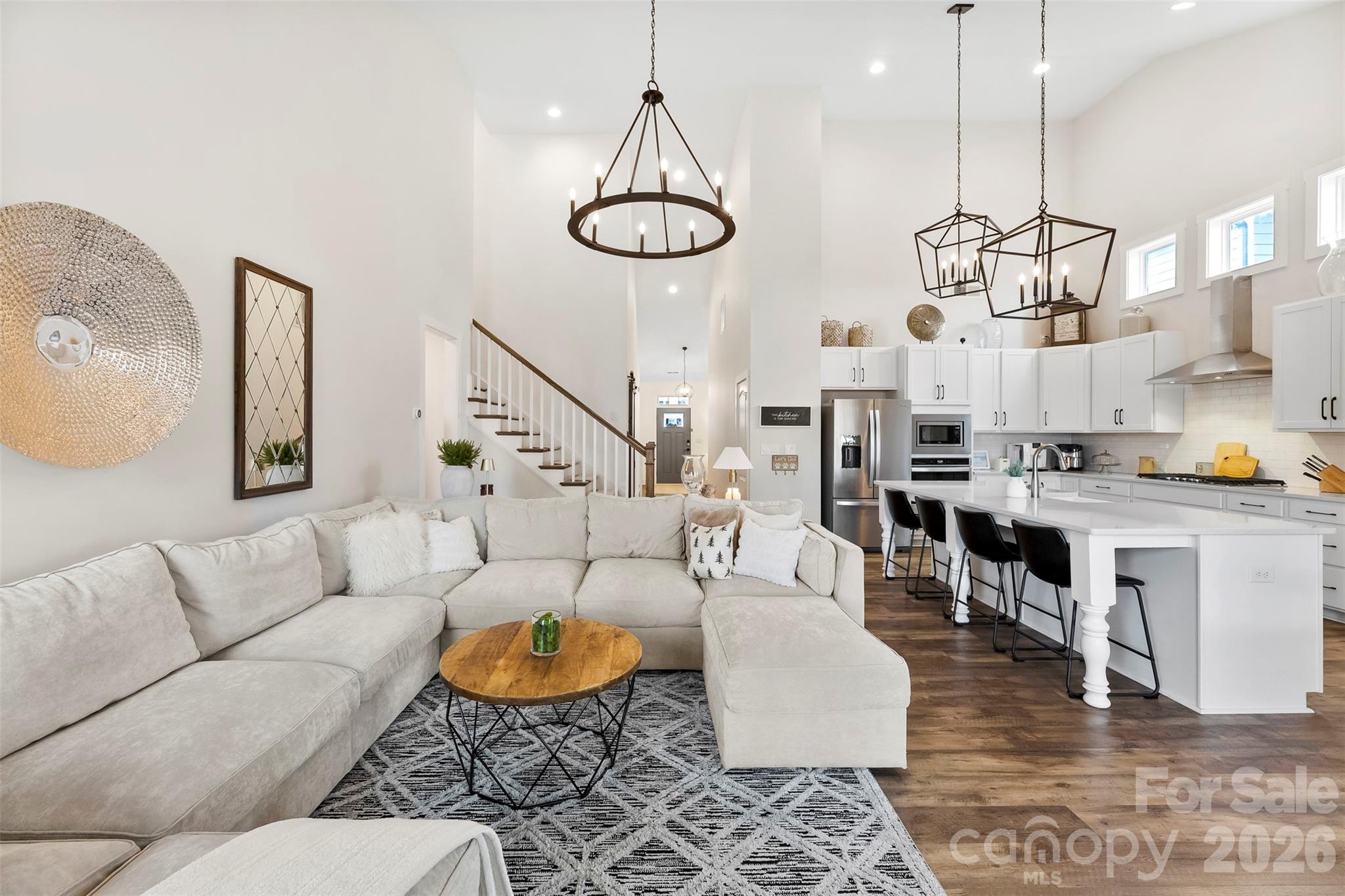 6283 Six String Court Fort Mill, SC 29708 - Photo 10 of 40 a living room with lots of furniture and kitchen view
