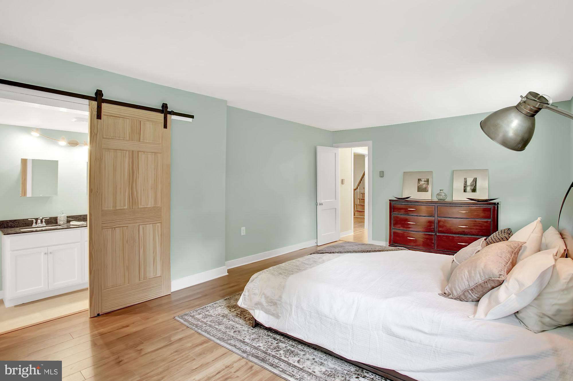 910 Limekiln Road Doylestown, PA 18901 - Photo 18 of 32 Barn door leads to main bath