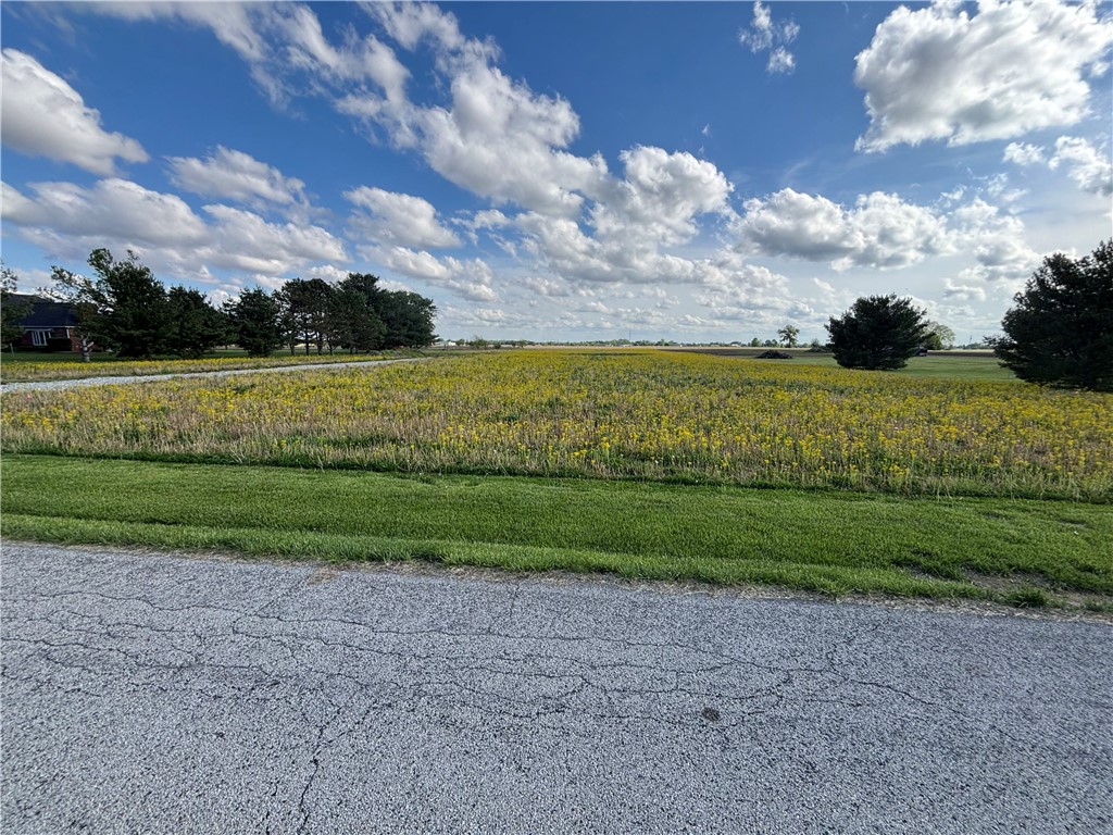1673 Foust Road Xenia, OH 45385 - Photo 1 of 4 This expansive lot offers a tranquil rural setting with mature trees and vast open fields.