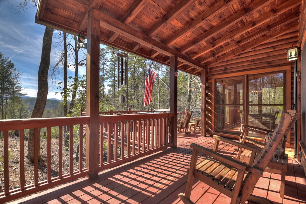 468 Conley Branch Road Blue Ridge, GA 30513 - Photo 15 of 20 a view of a balcony with wooden floor