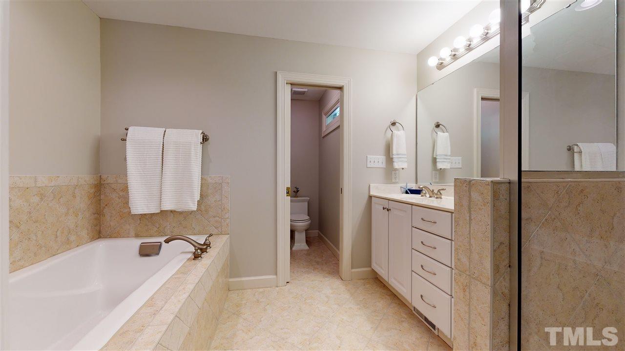 3132 Mt Vernon Church Road Raleigh, NC 27613 - Photo 19 of 30 Master Bathroom has Tile floors with Separate Water Closet.