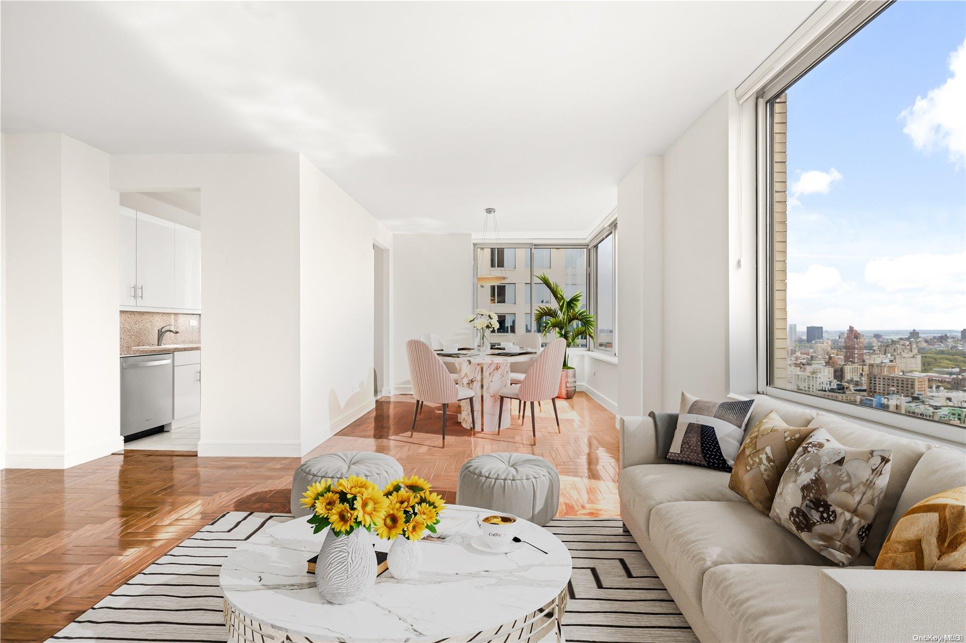 200 Riverside Boulevard, Unit 46C Manhattan, NY 10069 - Photo 1 of 1 a living room with furniture kitchen view and a window