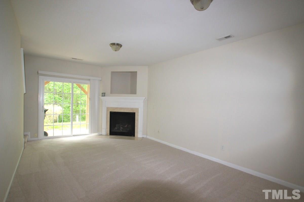 7854 Spungold Street Raleigh, NC 27617 - Photo 12 of 20 Finished basement/den area