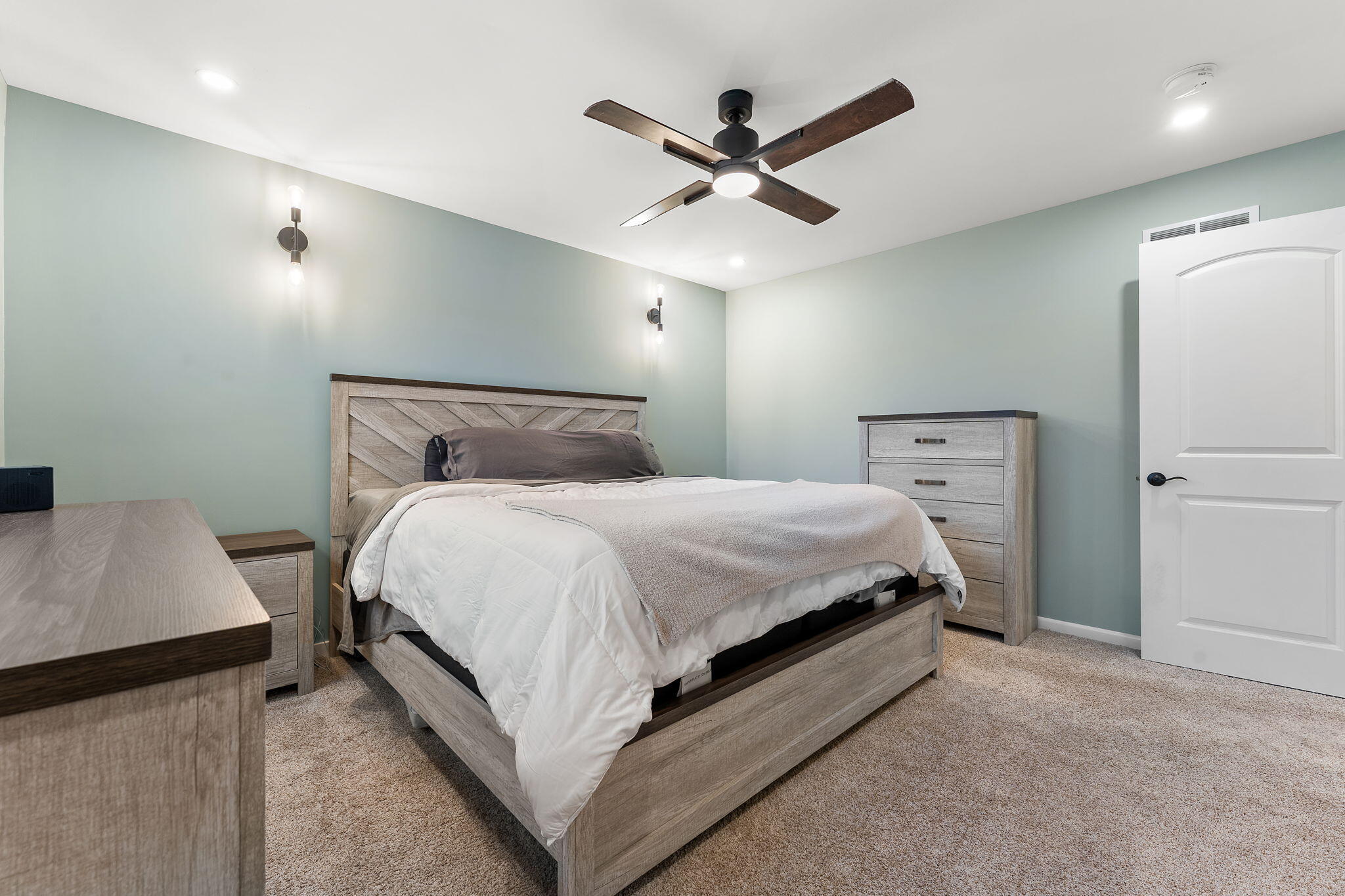 3036 99th Street Highland, IN 46322 - Photo 11 of 22 a bed room with a bed and a ceiling fan