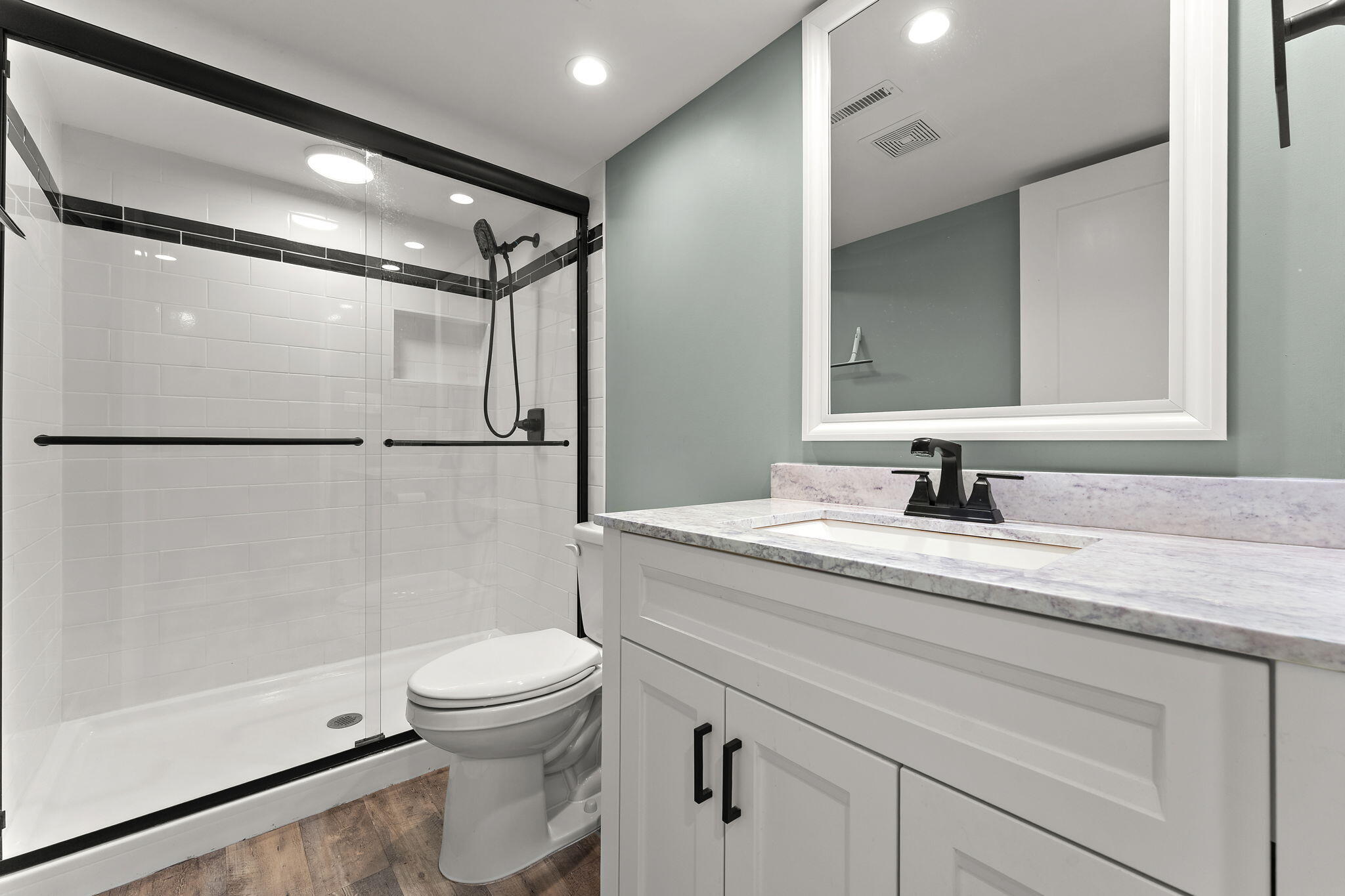 3036 99th Street Highland, IN 46322 - Photo 15 of 22 a bathroom with a granite countertop sink toilet and shower