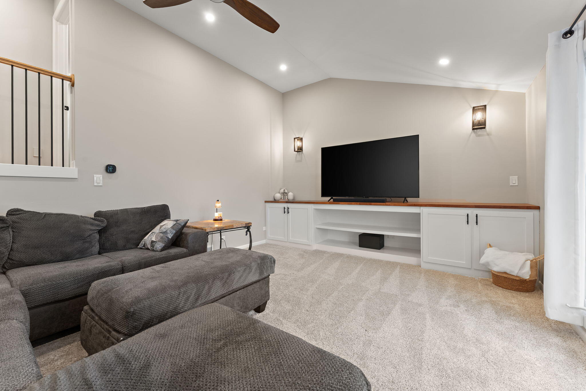 3036 99th Street Highland, IN 46322 - Photo 8 of 22 a living room with furniture and a flat screen tv