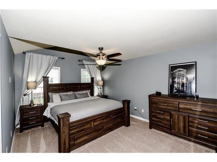 2657 Cedar Drive Lawrenceville, GA 30043 - Photo 16 of 30 a bedroom with a bed and a dresser