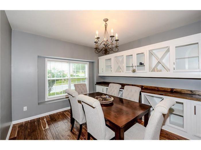 2657 Cedar Drive Lawrenceville, GA 30043 - Photo 6 of 30 a view of a dining room with furniture and wooden floor