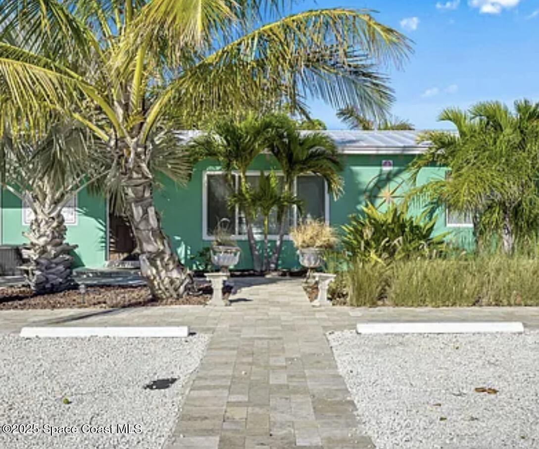 105 Northeast 3rd Street, Unit AD Satellite Beach, FL 32937 - Photo 2 of 27 a view of outdoor space yard and porch