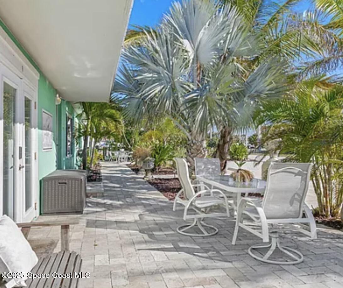 105 Northeast 3rd Street, Unit AD Satellite Beach, FL 32937 - Photo 4 of 27 a view of outdoor space yard and patio