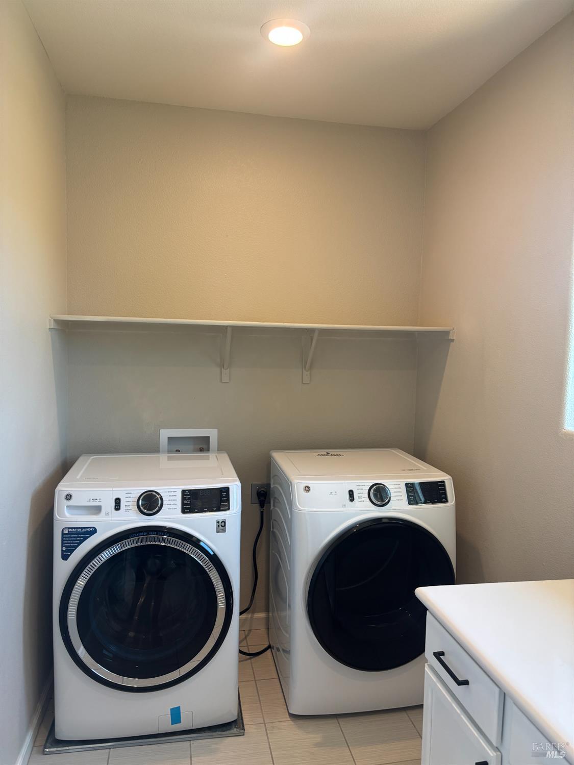 5114 Kolton Place Rohnert Park, CA 94928 - Photo 26 of 37 a utility room with dryer and washer