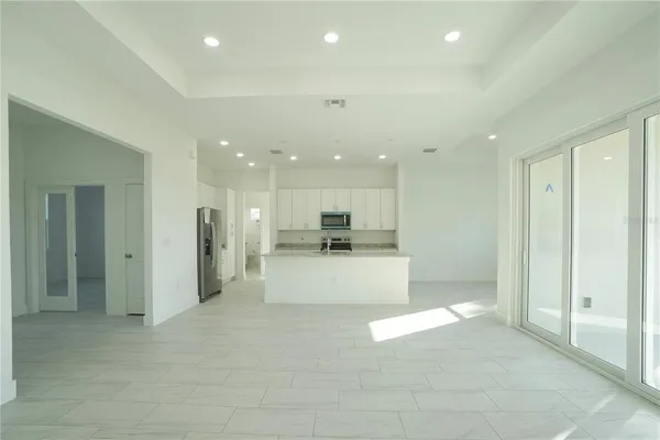 a view of an empty room with a bathroom