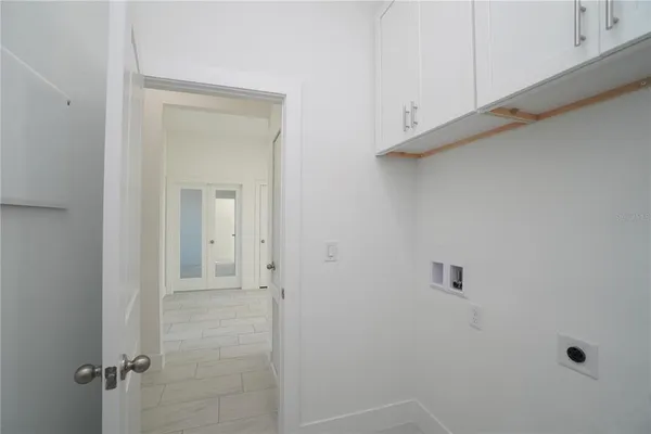 a kitchen with stainless steel appliances a refrigerator and a sink