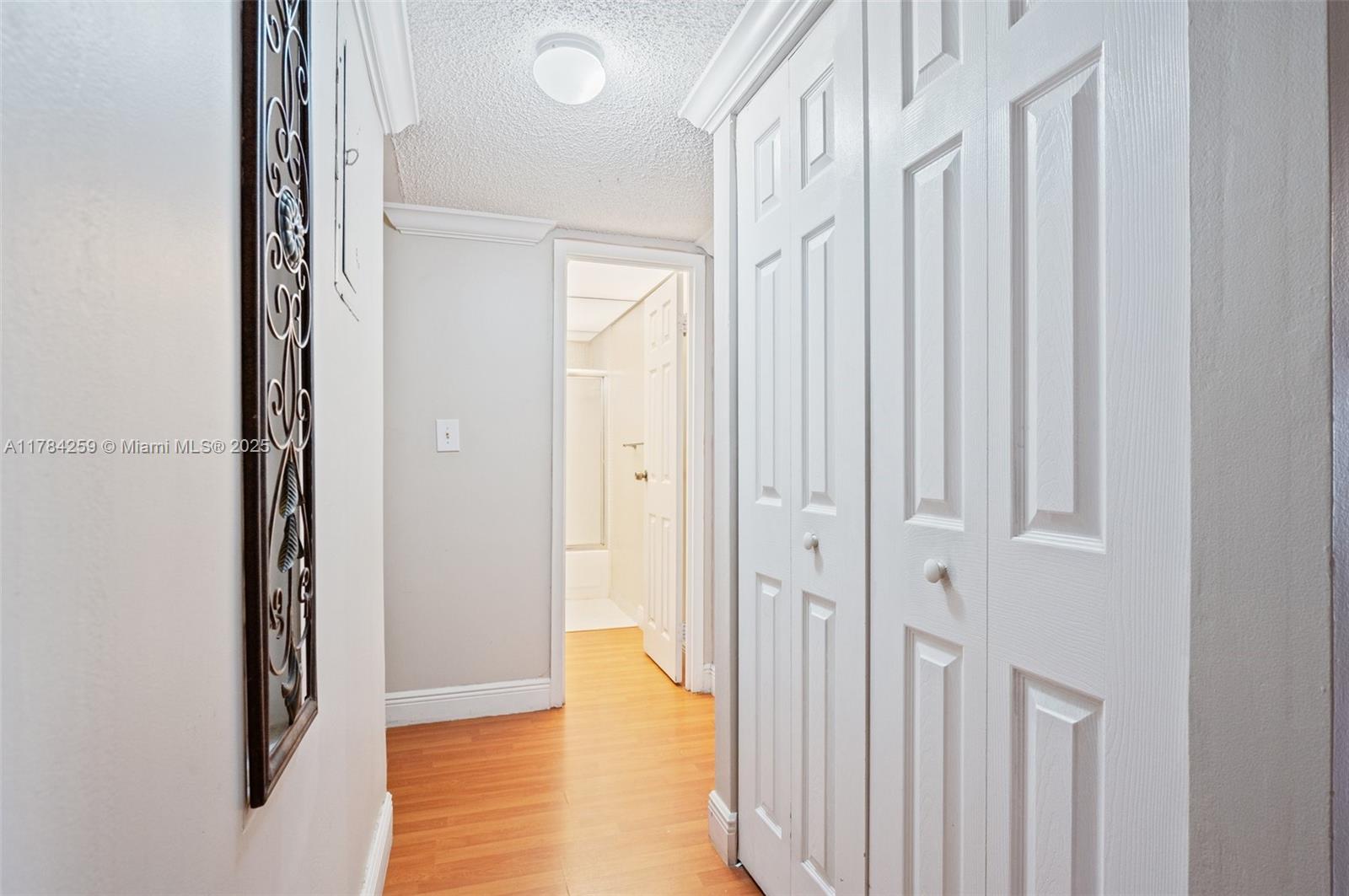 3000 Riverside Drive, Unit 3091 Coral Springs, FL 33065 - Photo 9 of 25 Hall Storage Closet