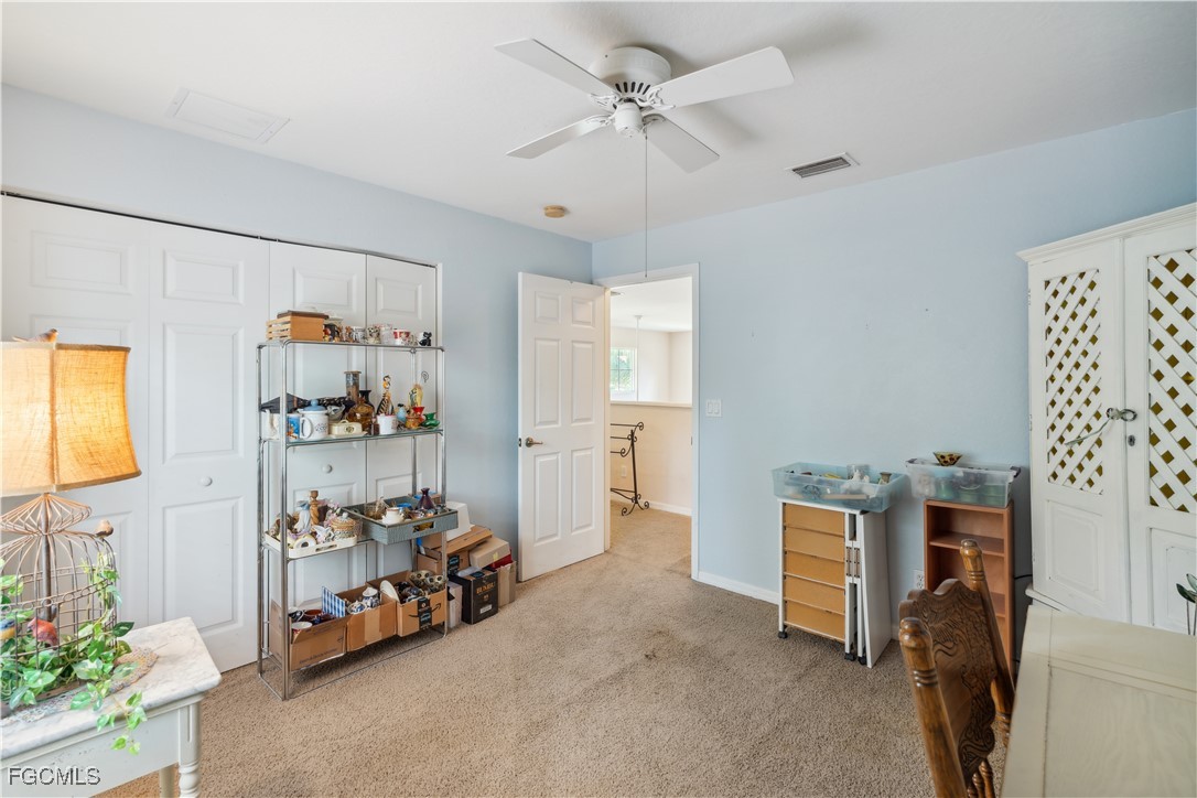 9475 Silver Pine Loop Fort Myers, FL 33967 - Photo 14 of 34 a view of a workspace with furniture and a window