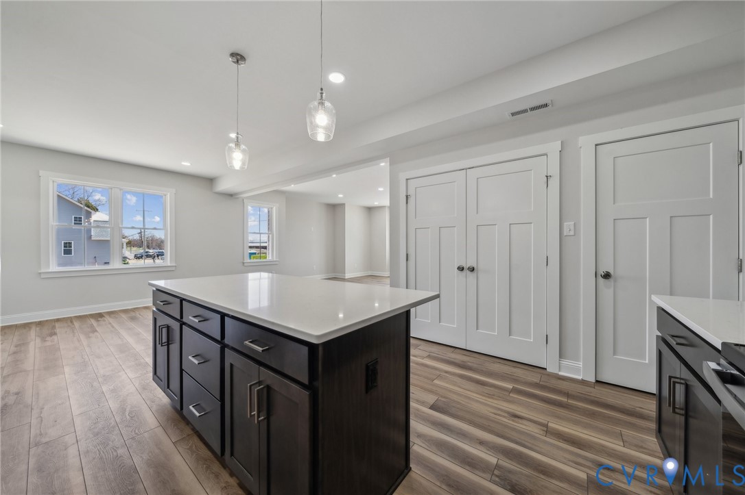2916 Congress Road North Chesterfield, VA 23237 - Photo 8 of 21 a kitchen with a wooden floor and window