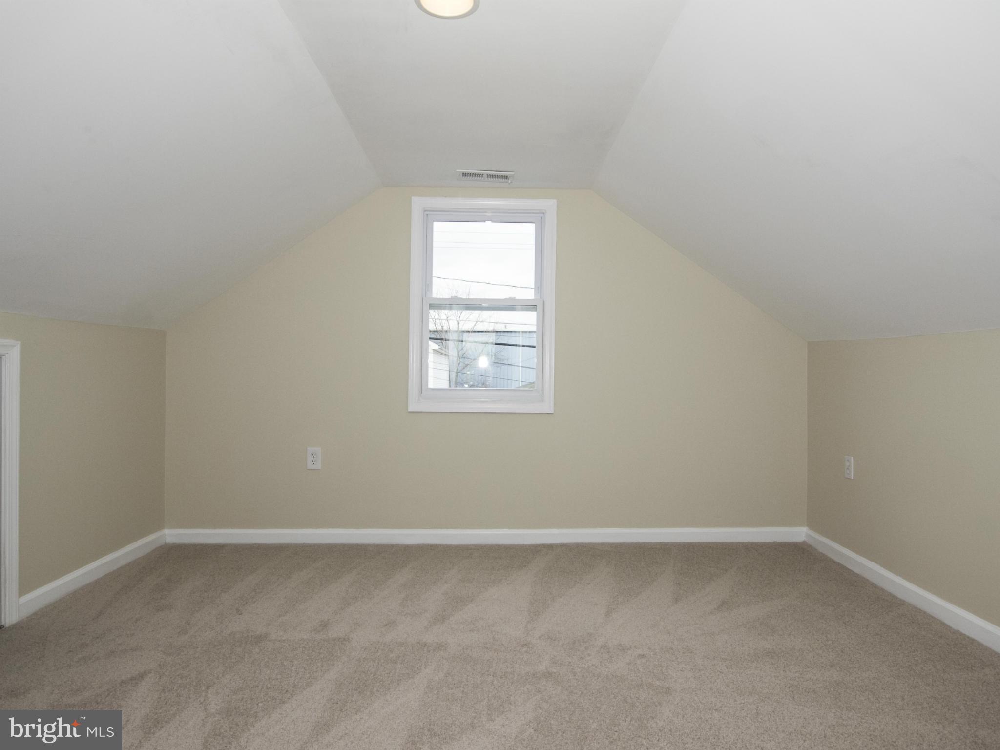 1220 Willow Road Baltimore, MD 21222 - Photo 22 of 23 an empty room with a window