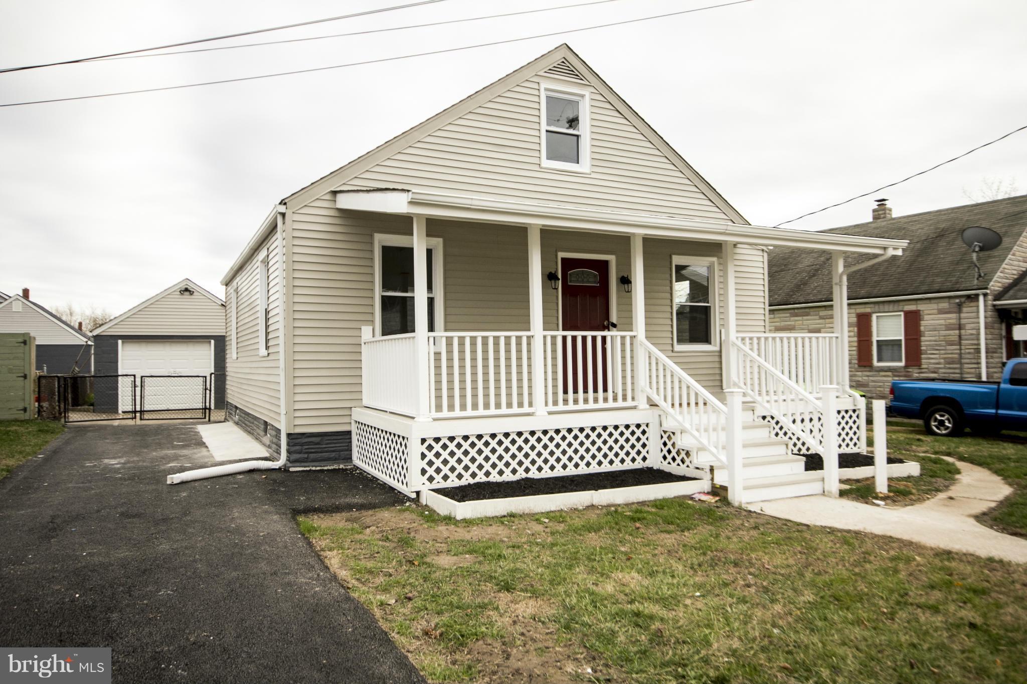 1220 Willow Road Baltimore, MD 21222 - Photo 6 of 23 a front view of a house with a yard