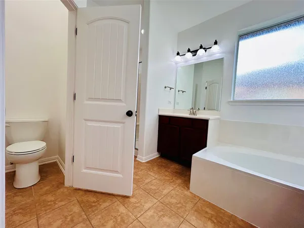 a view of a hallway with closet