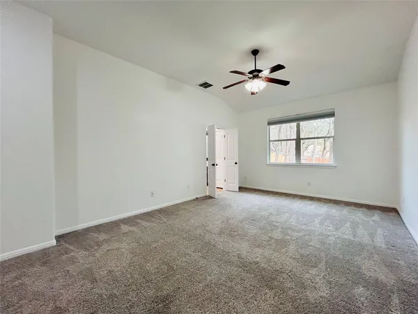a view of a furniture and window in a room