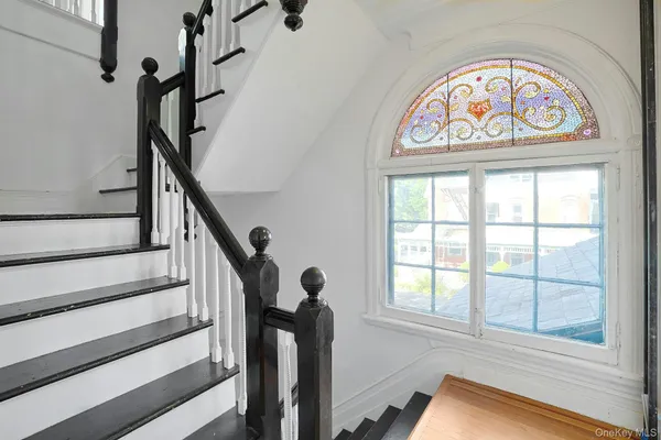 a view of entryway with a front door