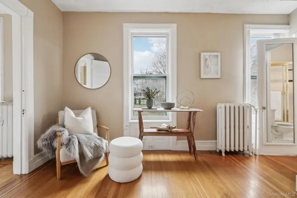 a living room with furniture and a window