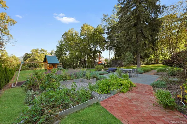 a view of a park with large trees