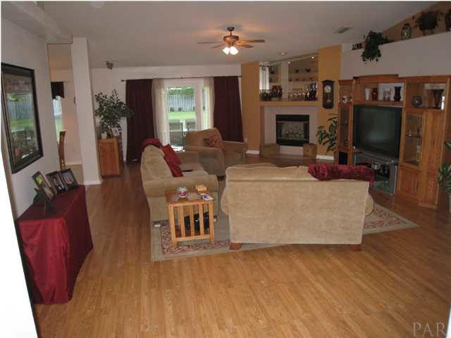 Open great room with wood floors