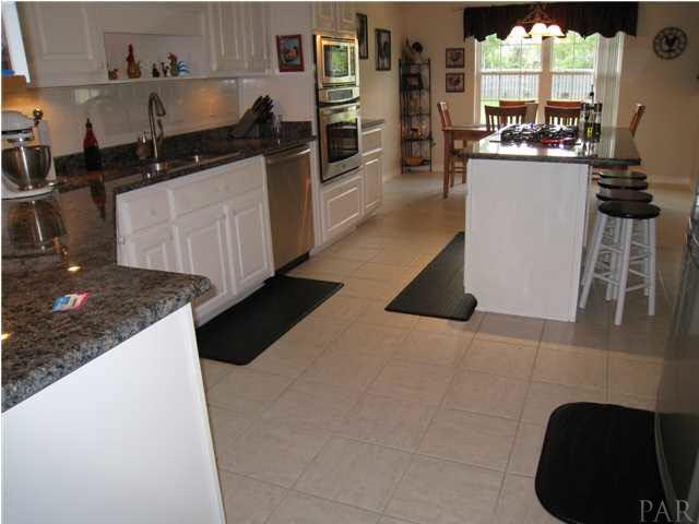 Large open kitchen with granite countertops and new stainless appliances