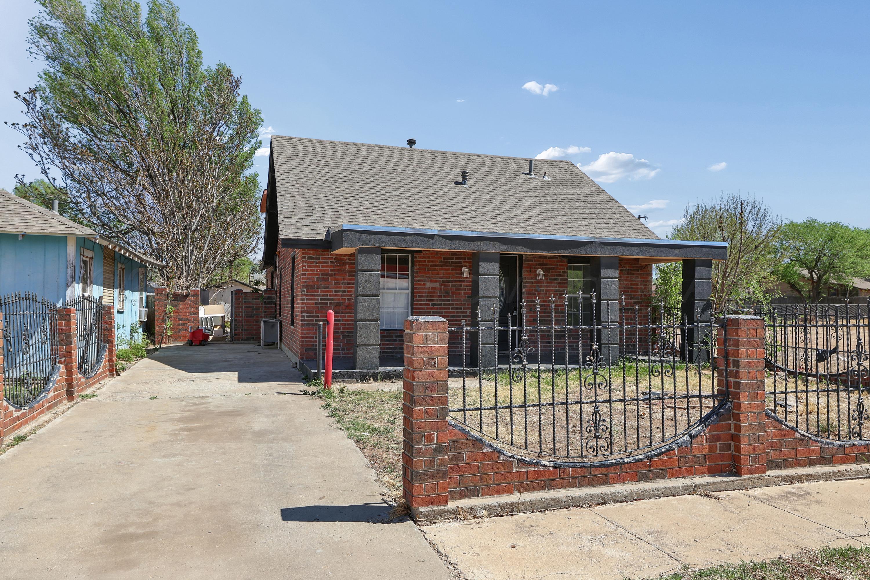 a front view of a house having yard