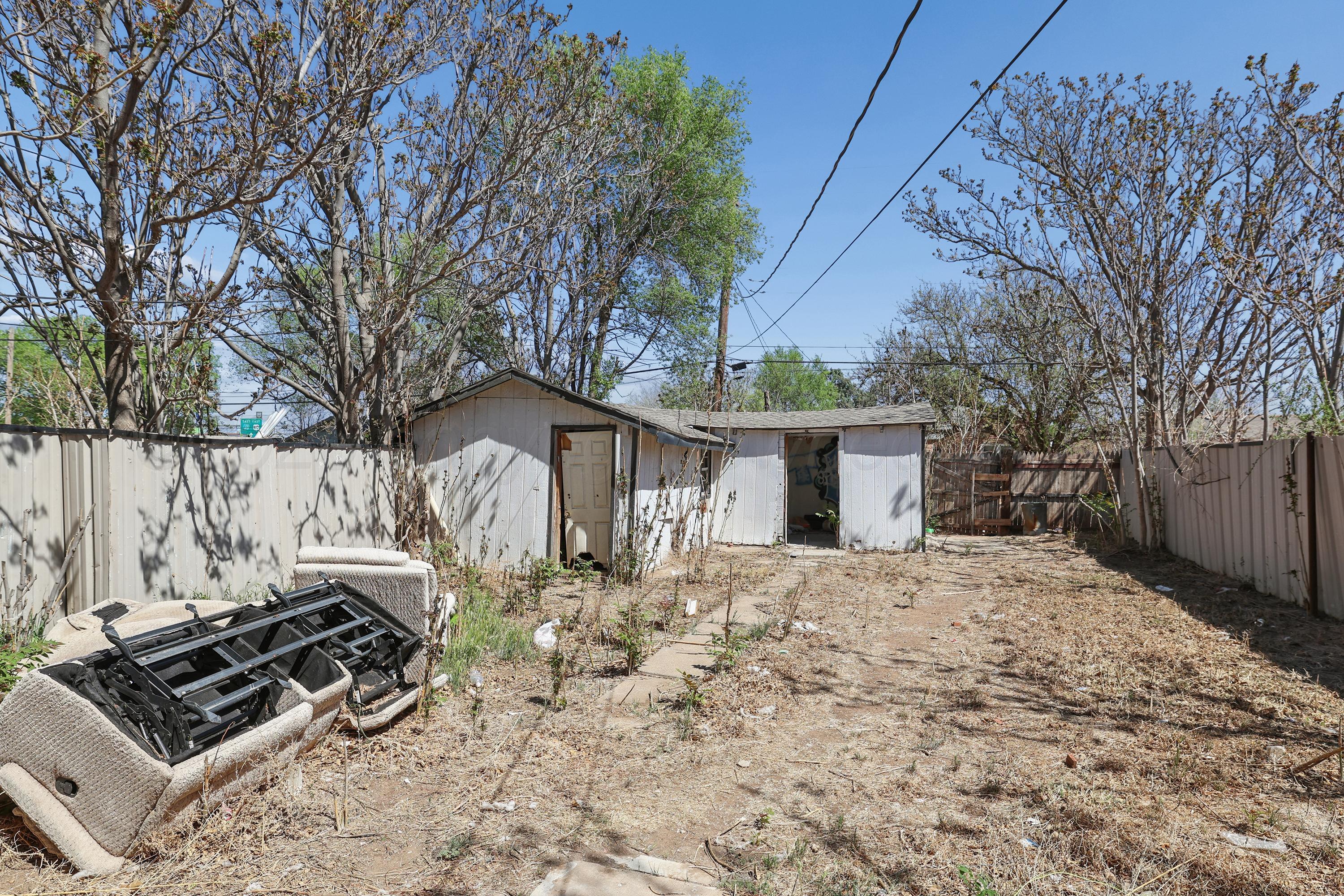 730 North Johnson Street Amarillo, TX 79107 - Photo 27 of 27 a front view of a house with a yard