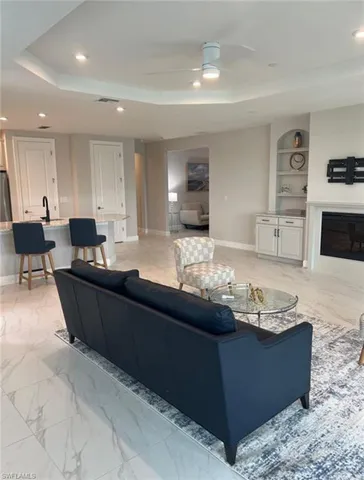 a living room with furniture and a couch