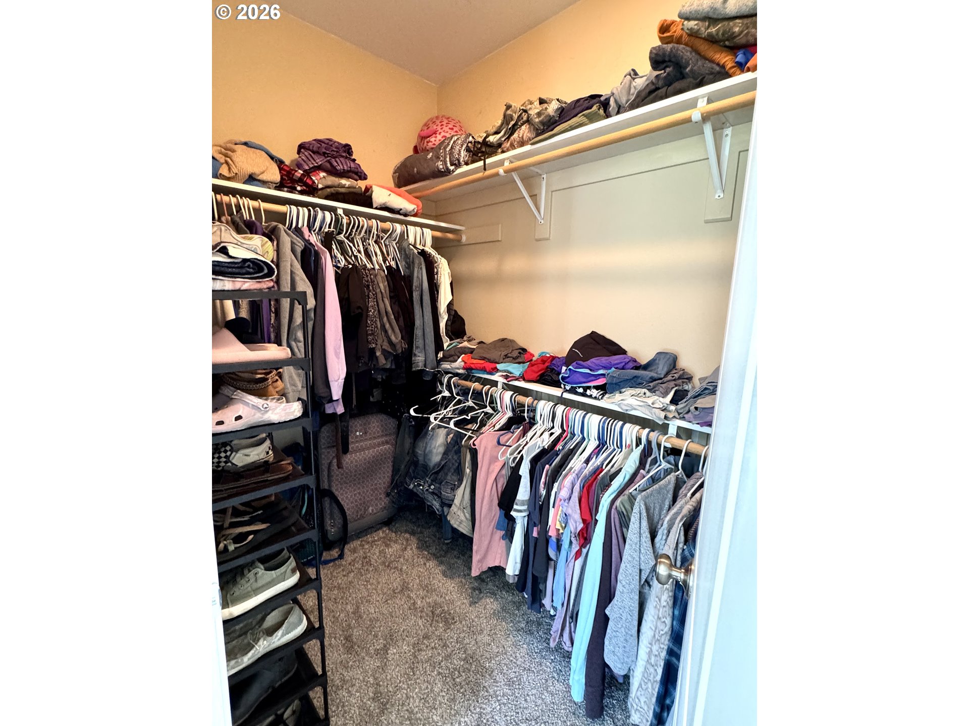 1105 G Street Baker City, OR 97814 - Photo 20 of 33 a view of walk in closet with clothes and shoes