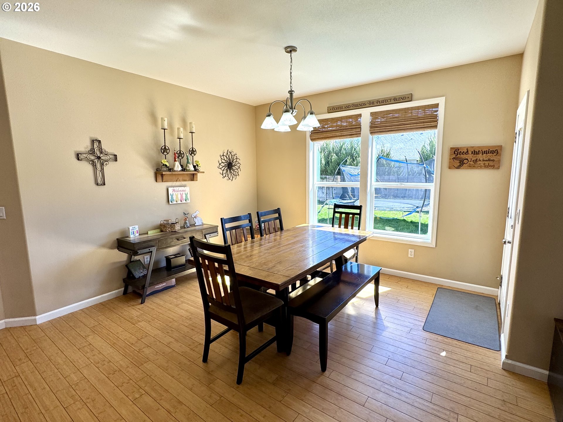 1105 G Street Baker City, OR 97814 - Photo 9 of 33 a view of a dining room with furniture window and wooden floor