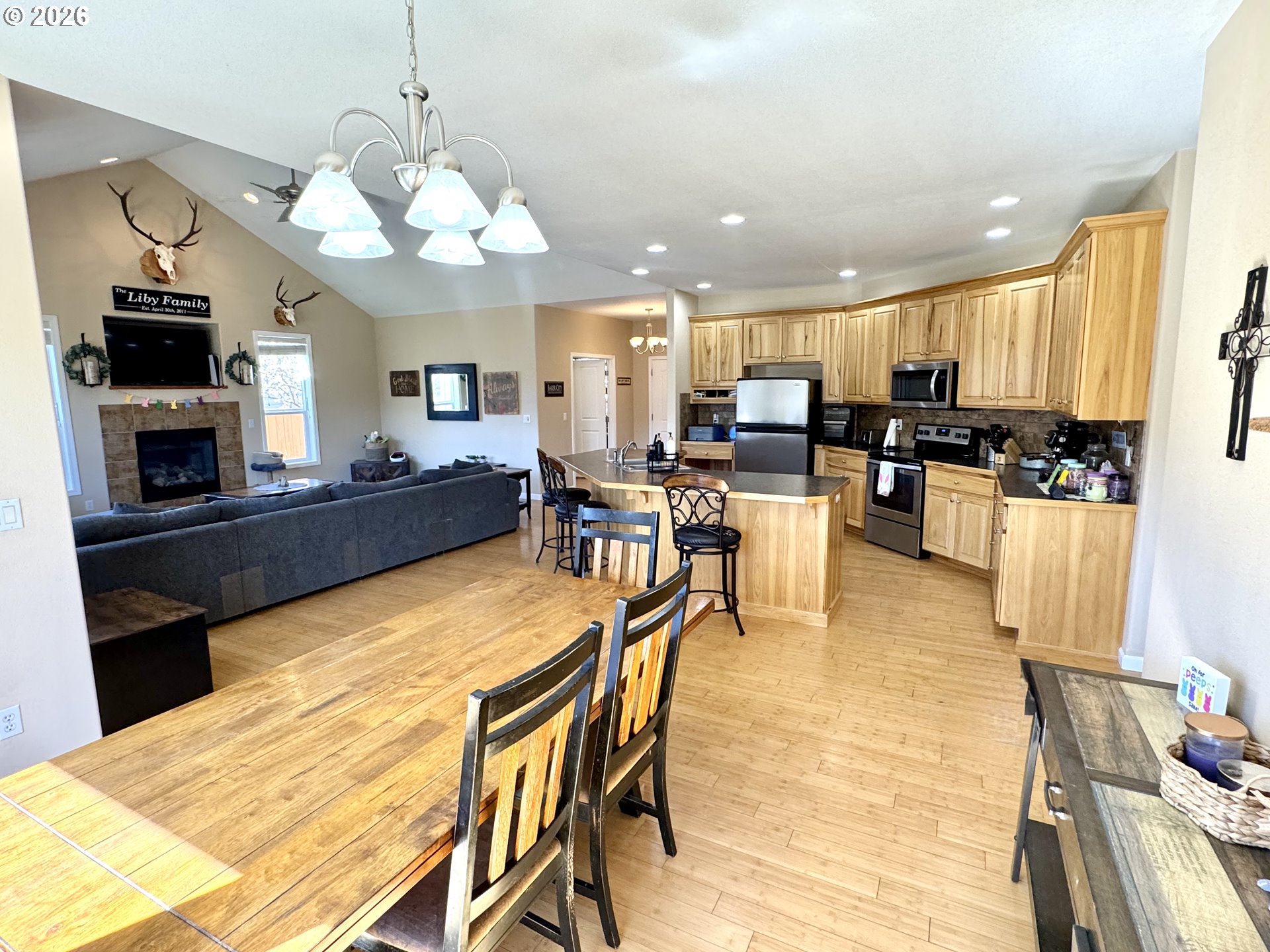 1105 G Street Baker City, OR 97814 - Photo 10 of 33 a large kitchen with a table and chairs