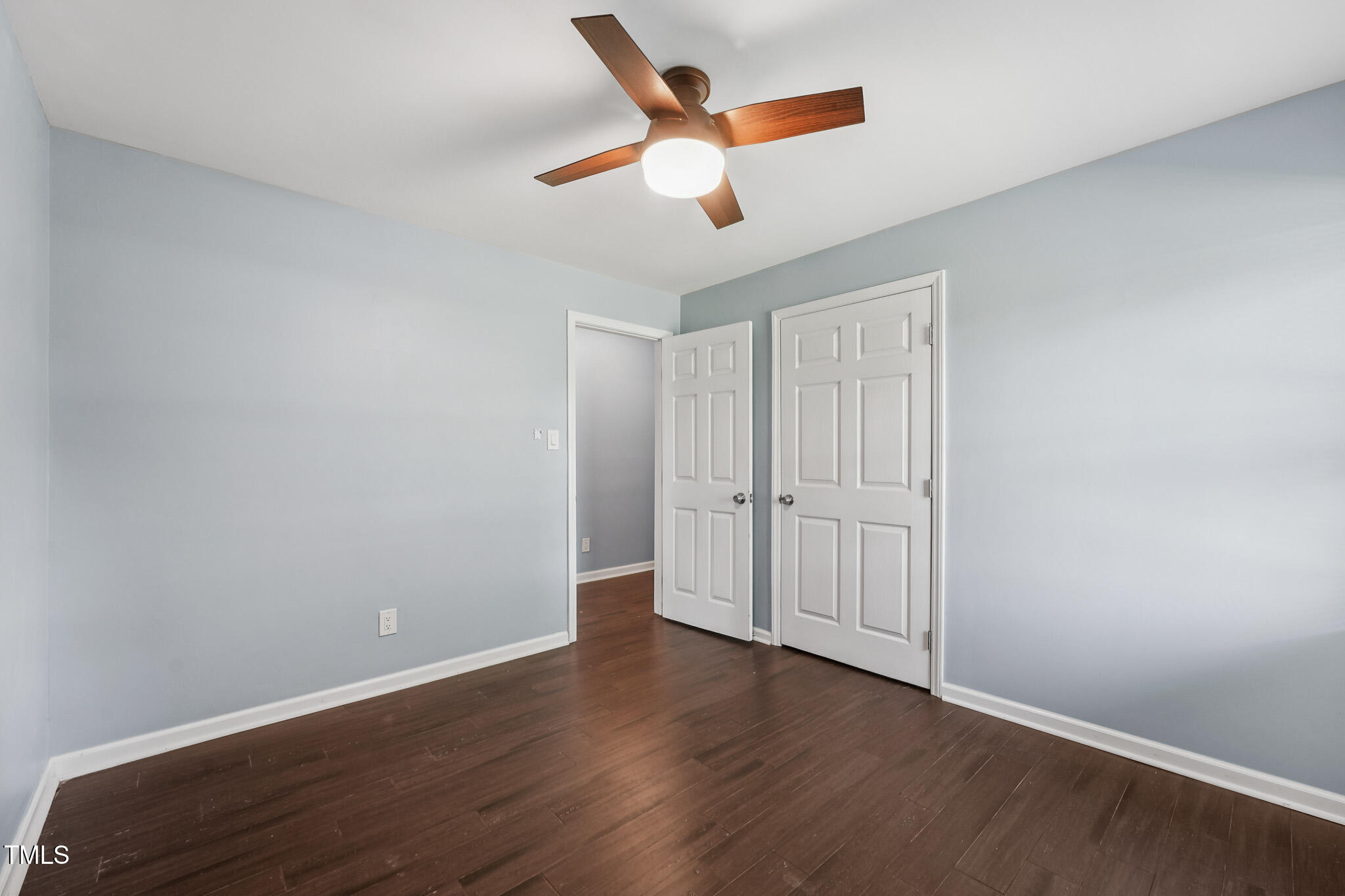 312 Mason Road Durham, NC 27712 - Photo 17 of 25 a view of an empty room with wooden floor