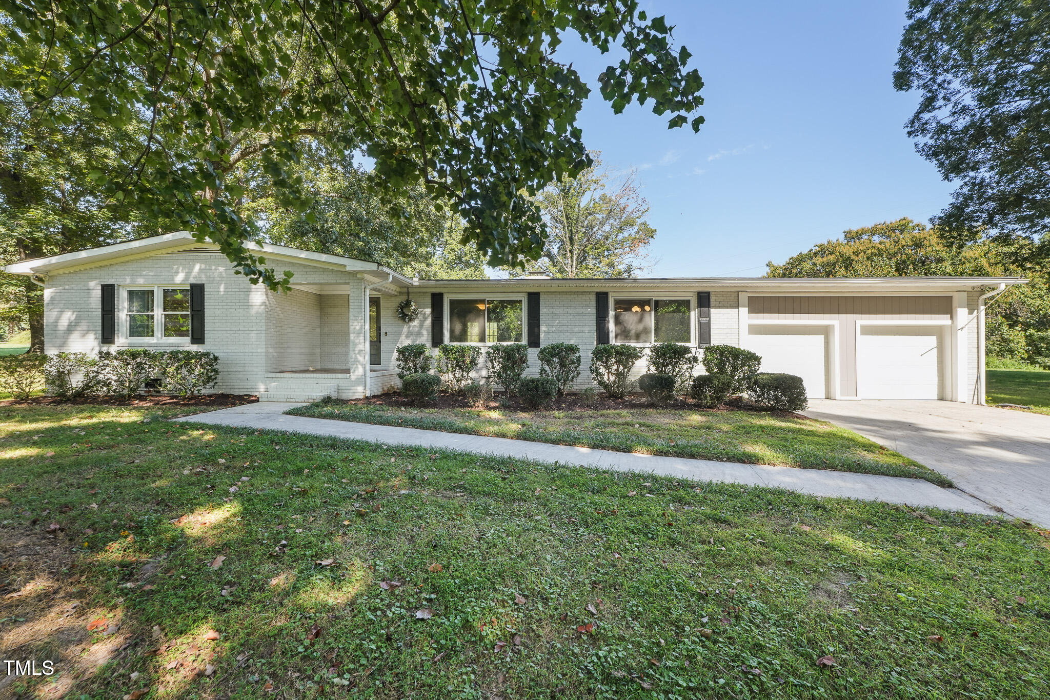 312 Mason Road Durham, NC 27712 - Photo 2 of 25 a front view of house with yard and green space